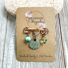 Load image into Gallery viewer, Aqua Pumpkin Medium Stitch Markers
